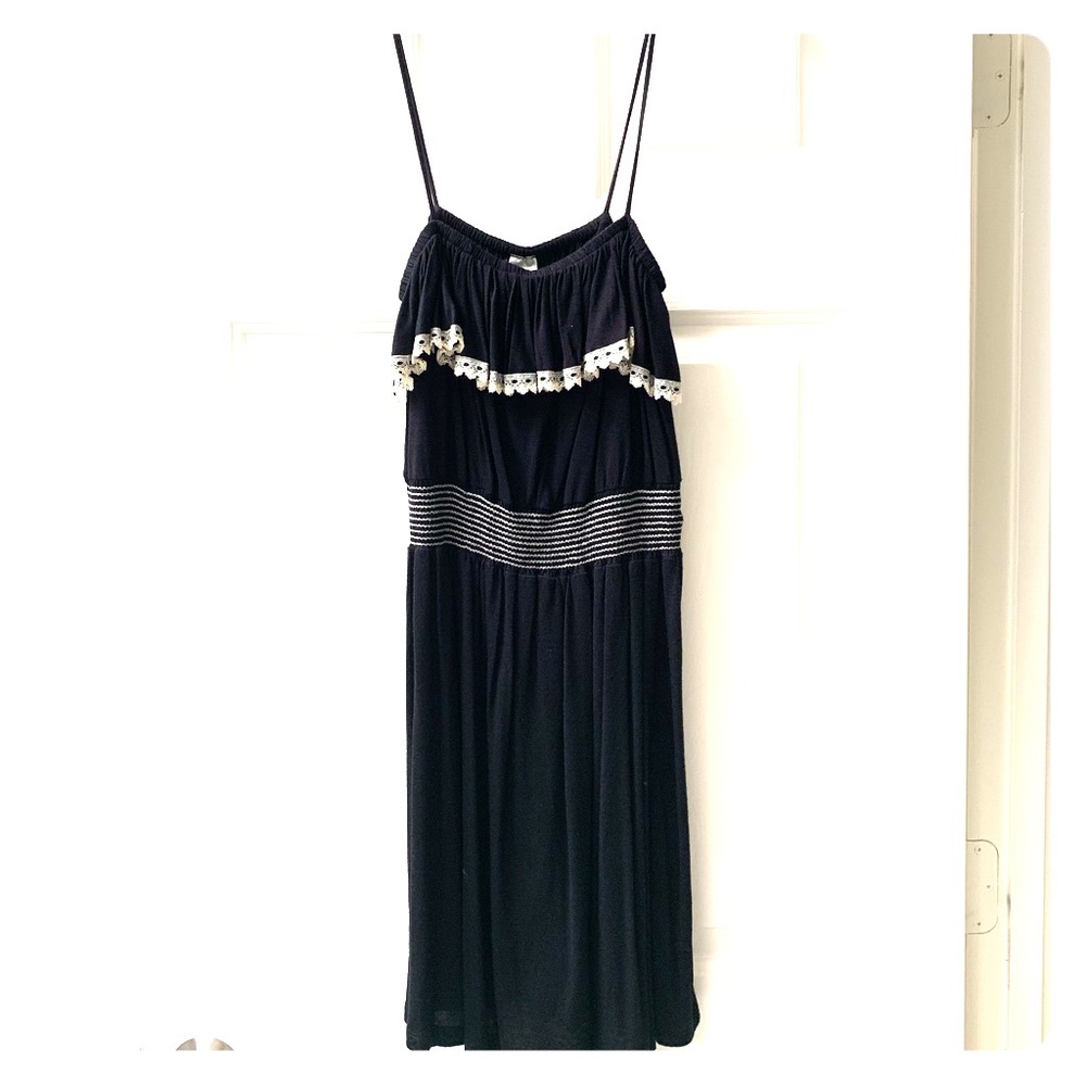 Black ruffle dress with white stitching